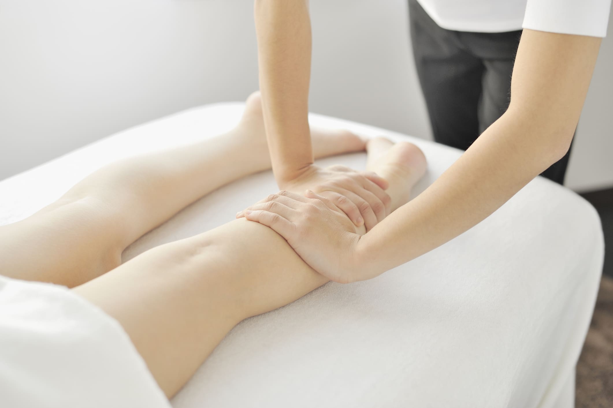 A person receives a massage